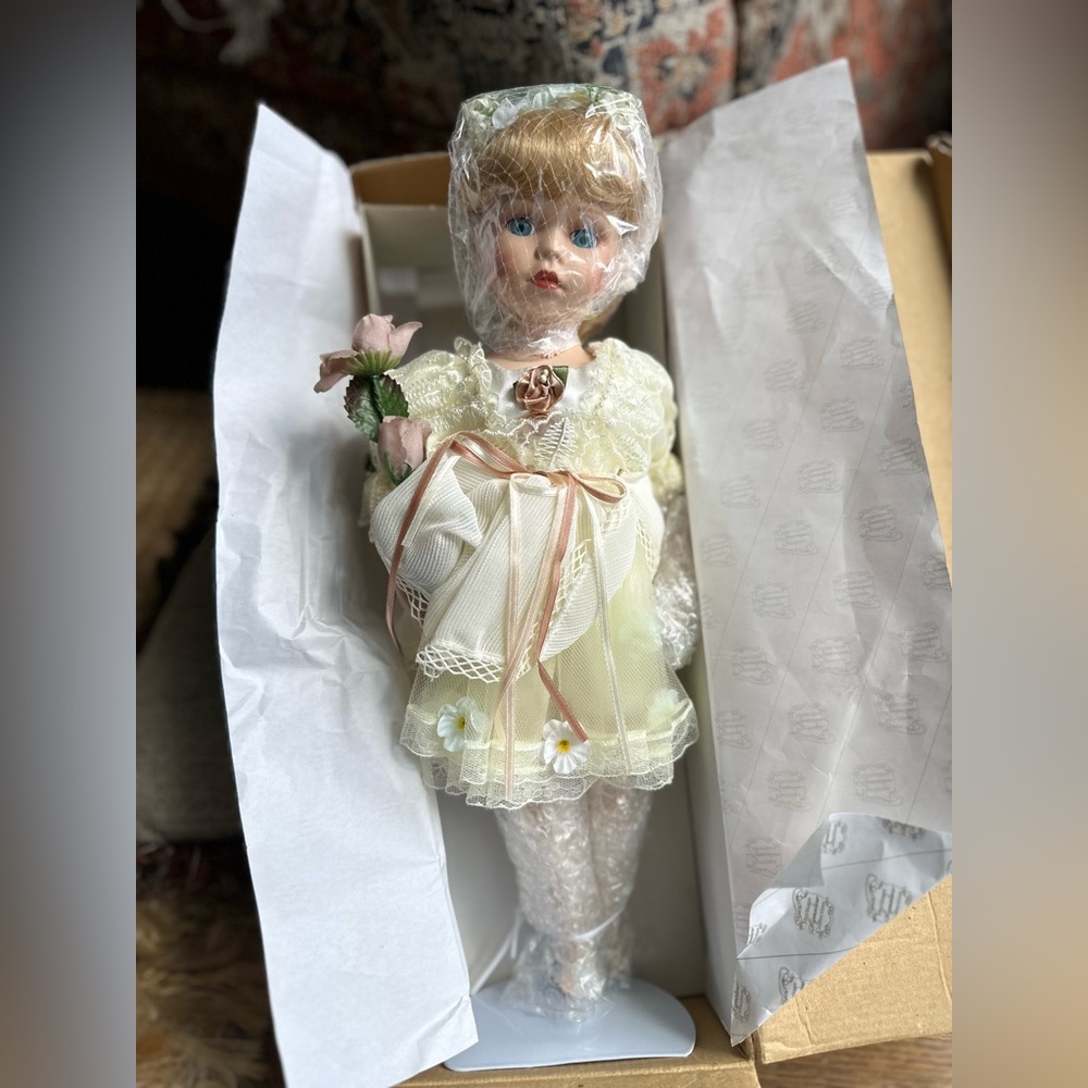 The Heritage Signature Collection
Porcelain Doll in Cream Dress